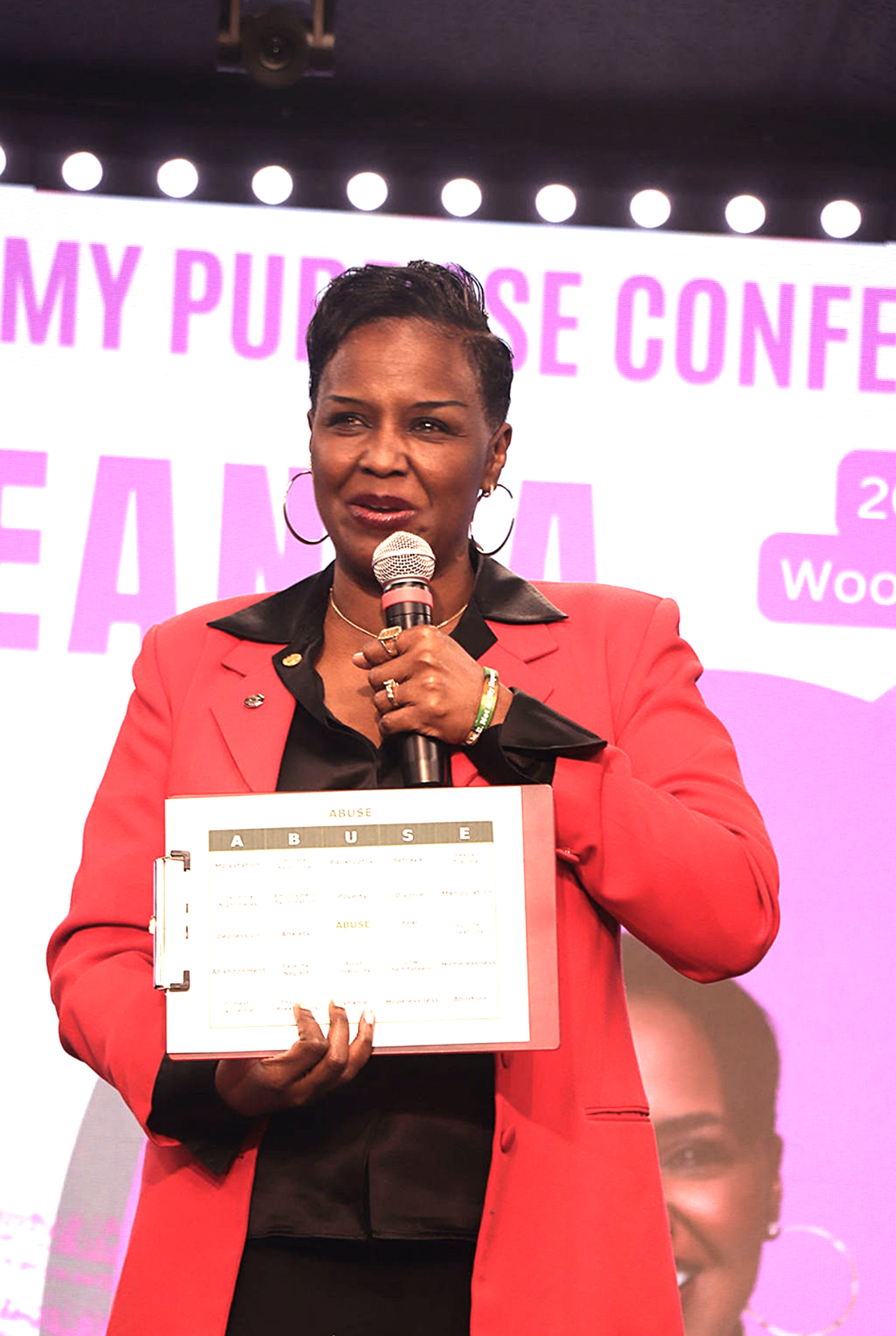 Dr. DeAnna delivering Not At My Expense keynote